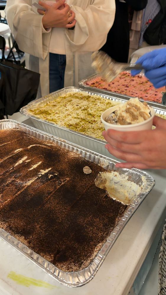 Serving tiramisu at an event